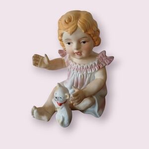 Royal Crown Piano Baby Figurine With Cat